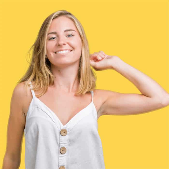 Why-Omega-woman-white-singlet-yellow-bkgd-700SQ